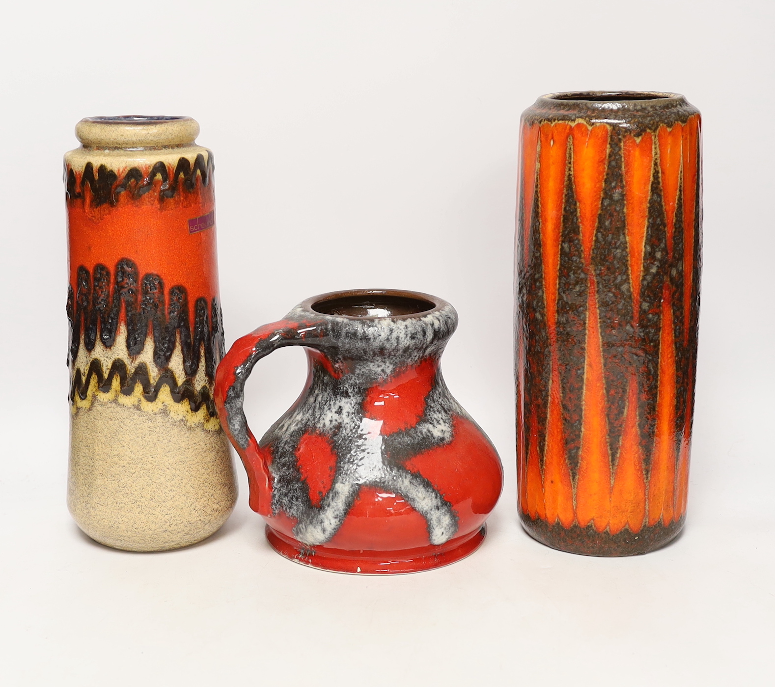 Three West German pottery vases, largest 28cm